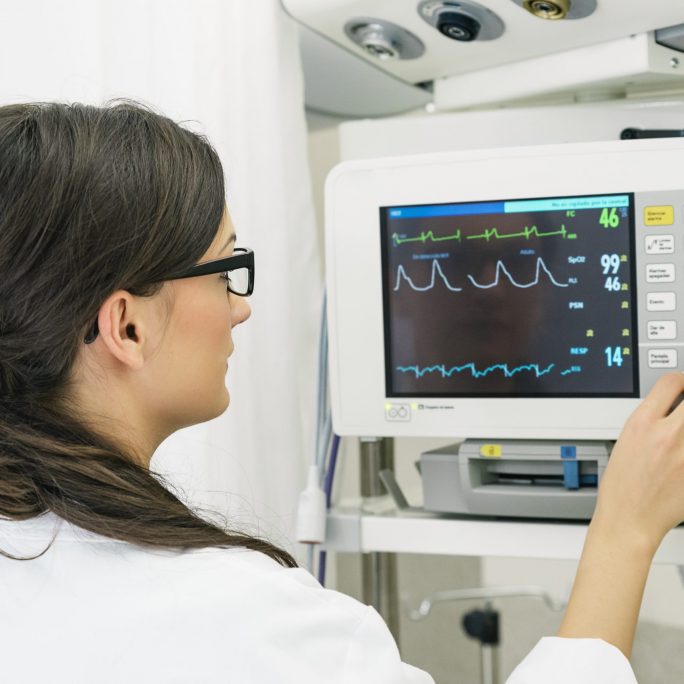 Medical doctor making ECG test in hospital. Medical Concept